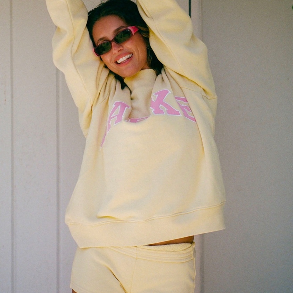 Parke Heritage Varsity Mockneck yellow with pink letters L/XL brand new
